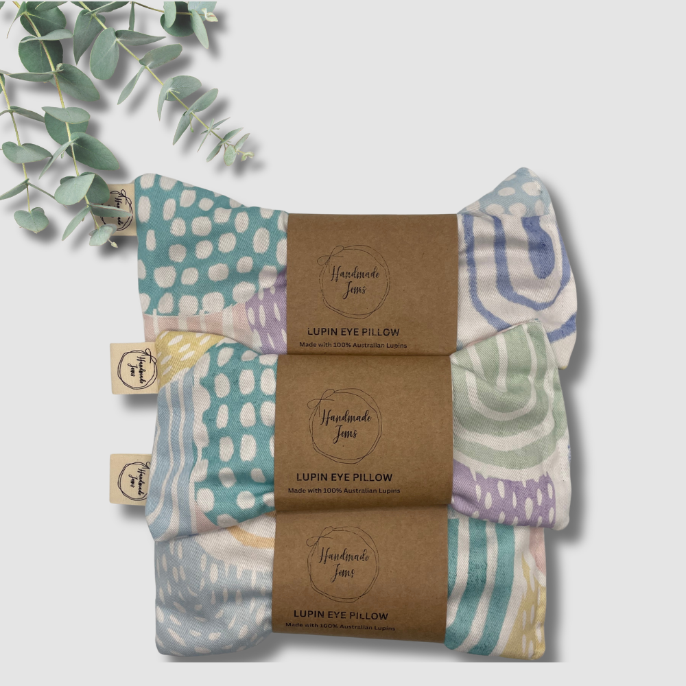 Packaged lupin eye pillow with a decorative label on a white background