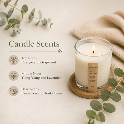 Candle with eucalyptus leaves and description of scents on a light background