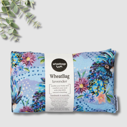 Wheatbag with cockatoo design and packaging on a white background